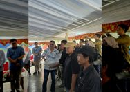 penebaran ikan nila di Danau Poso
